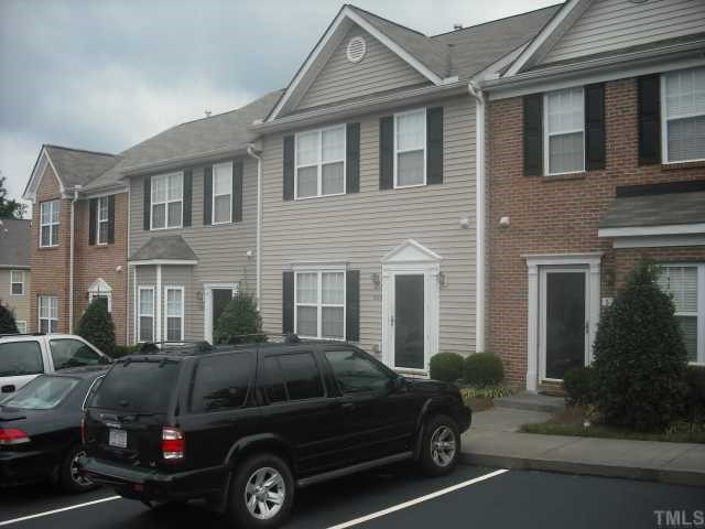 504 Erie Road Raleigh, NC 27610 - Photo 1 of 4 a car parked in front of a house