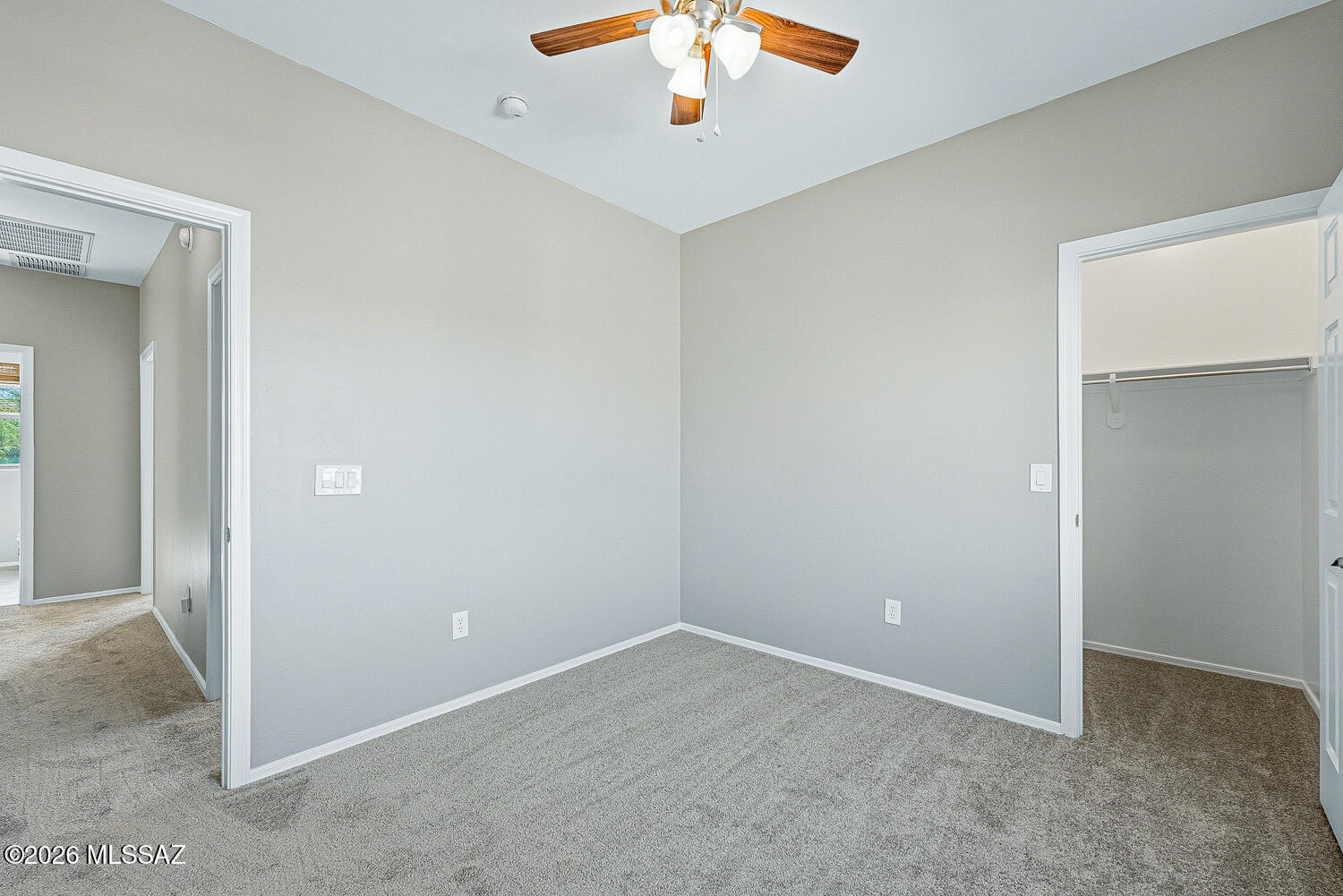 323 East Refuge Loop Vail, AZ 85641 - Photo 36 of 51 an empty room with a chandelier fan and entryway