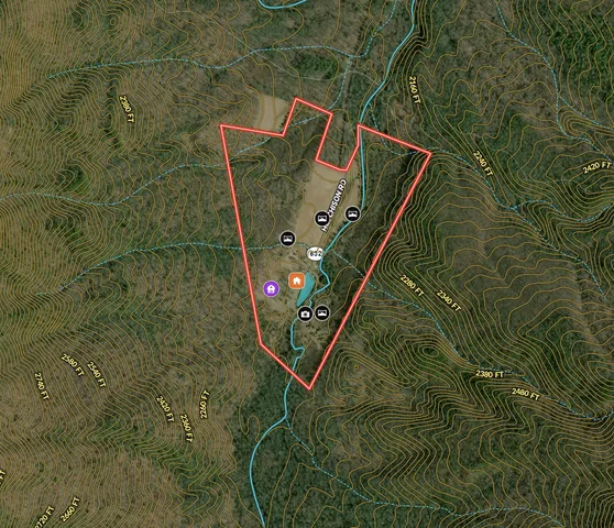 a view of a chairs and table on the balcony