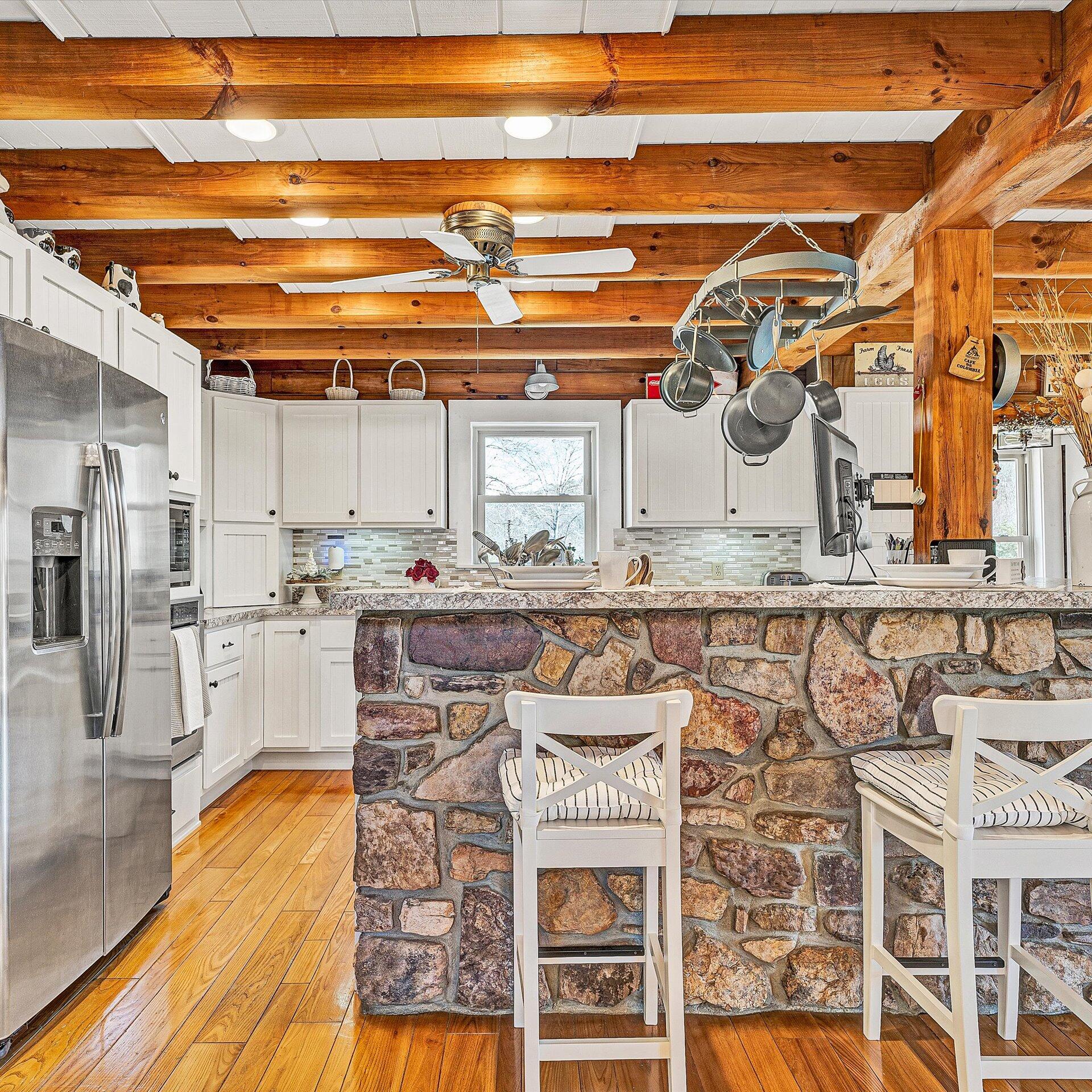 1504 Hutchison Road Newport, VA 24128 - Photo 25 of 99 a kitchen with a stove and a white refrigerator