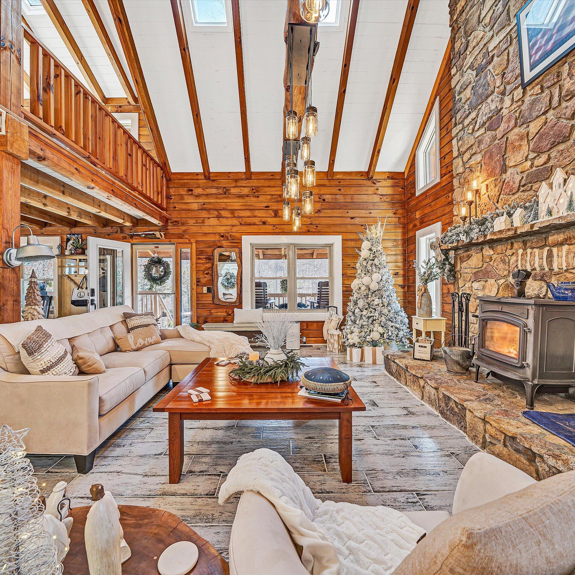 1504 Hutchison Road Newport, VA 24128 - Photo 33 of 99 a living room with fireplace furniture and a rug
