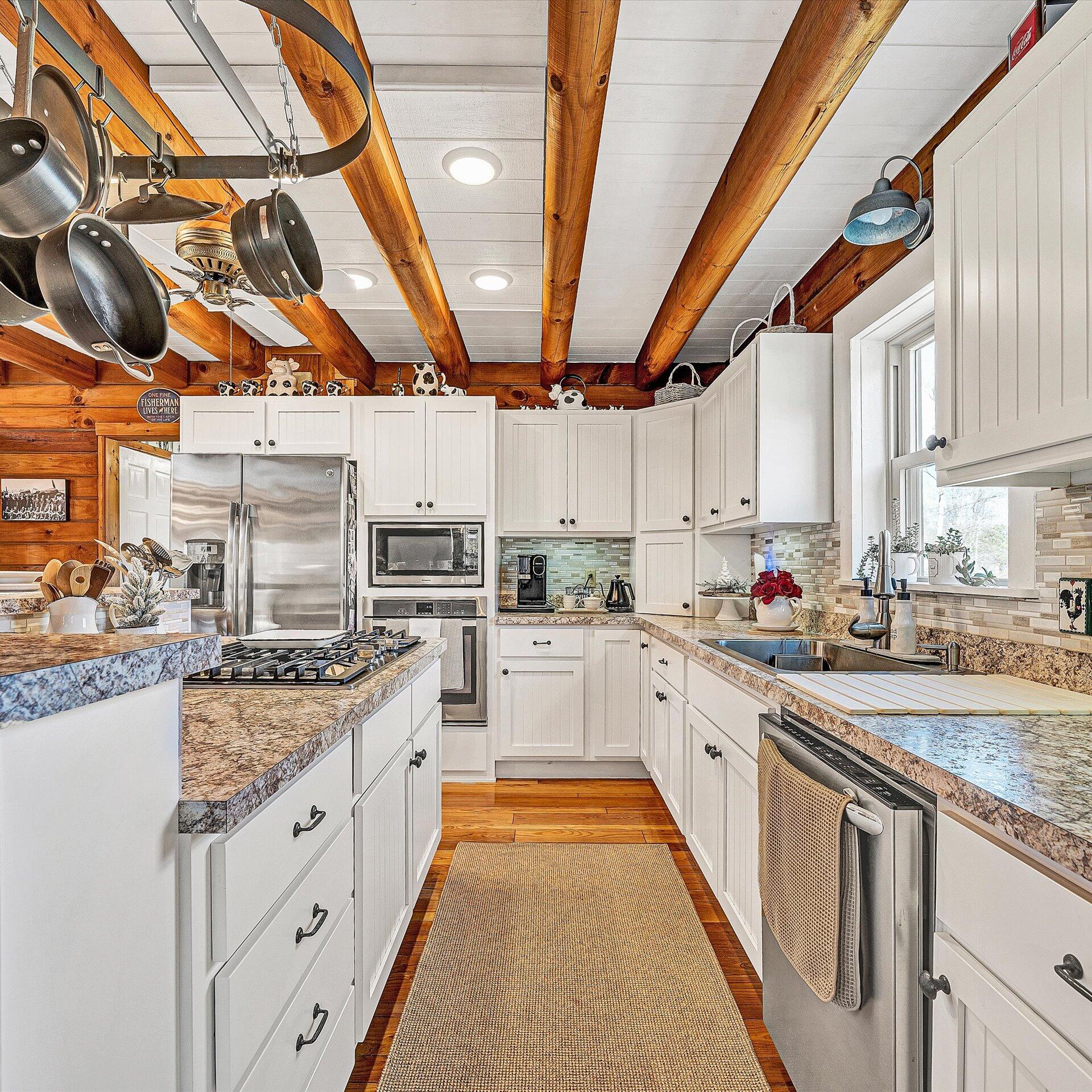 1504 Hutchison Road Newport, VA 24128 - Photo 5 of 99 a kitchen with stainless steel appliances granite countertop a sink and cabinets