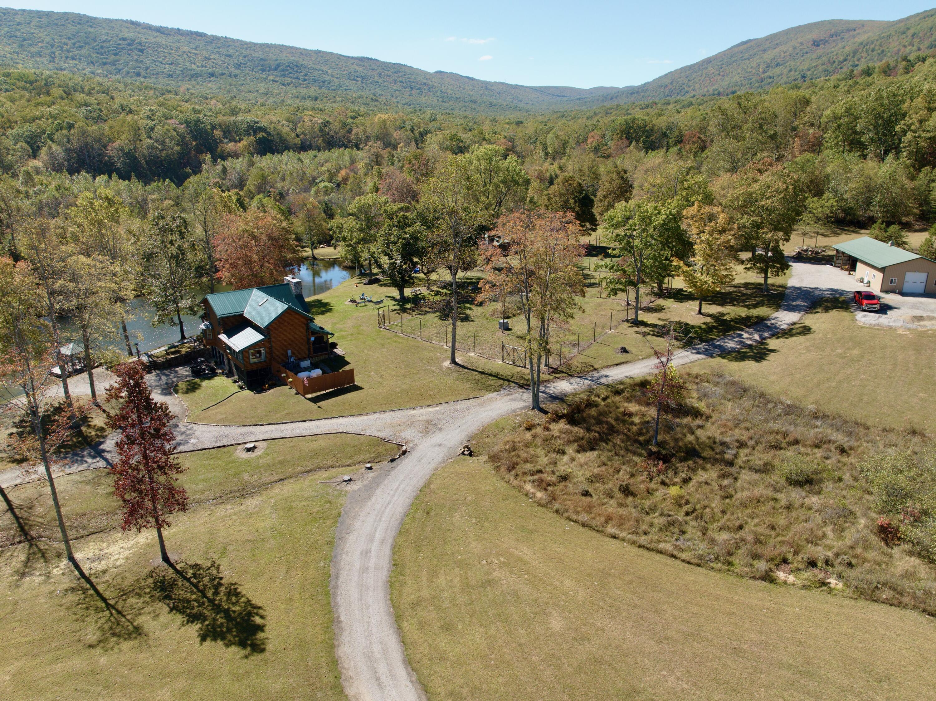 1504 Hutchison Road Newport, VA 24128 - Photo 54 of 99 a view of a swimming pool with a mountain