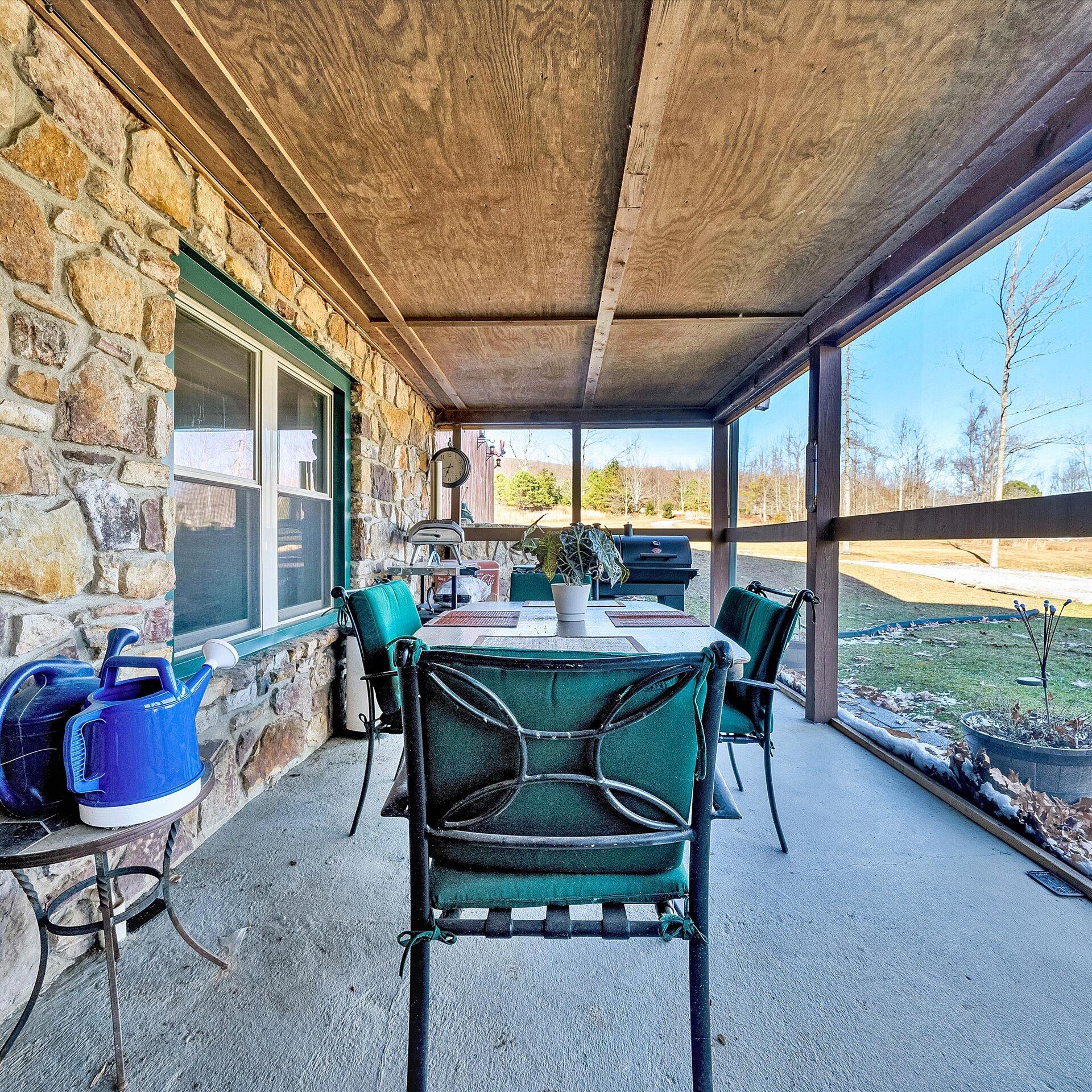 1504 Hutchison Road Newport, VA 24128 - Photo 70 of 99 a view of a dining room with furniture window and outside view