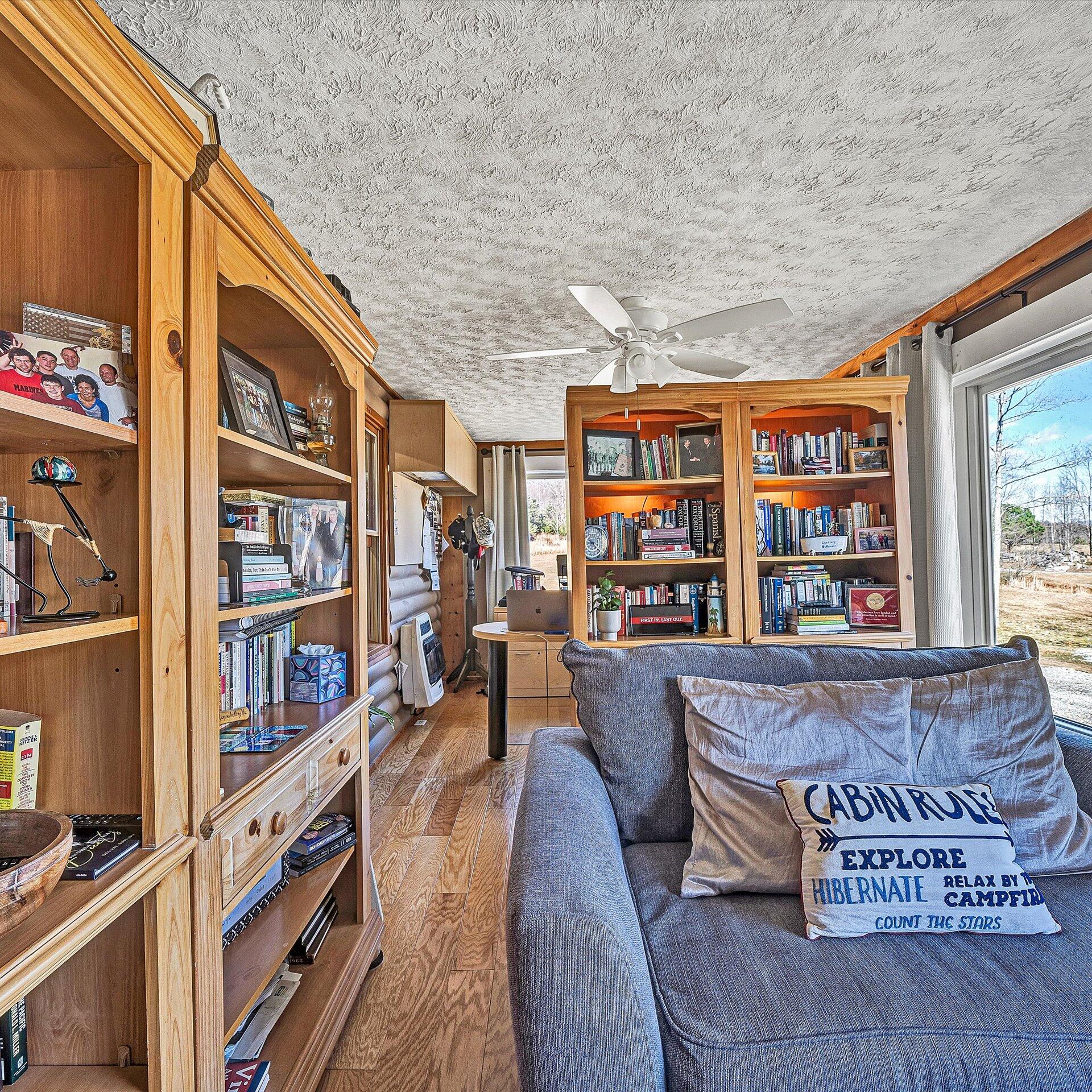 1504 Hutchison Road Newport, VA 24128 - Photo 90 of 99 a living room with furniture and a book shelf