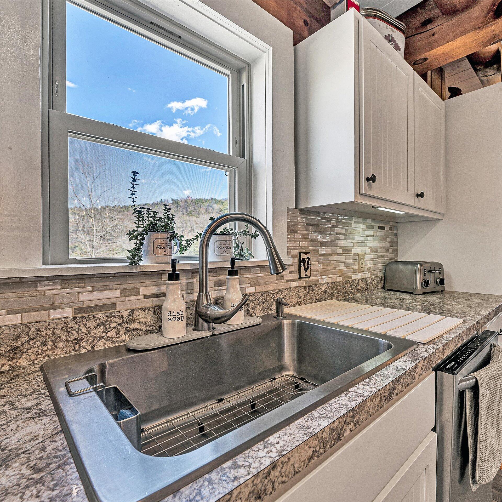 1504 Hutchison Road Newport, VA 24128 - Photo 98 of 99 a kitchen with a sink and cabinets