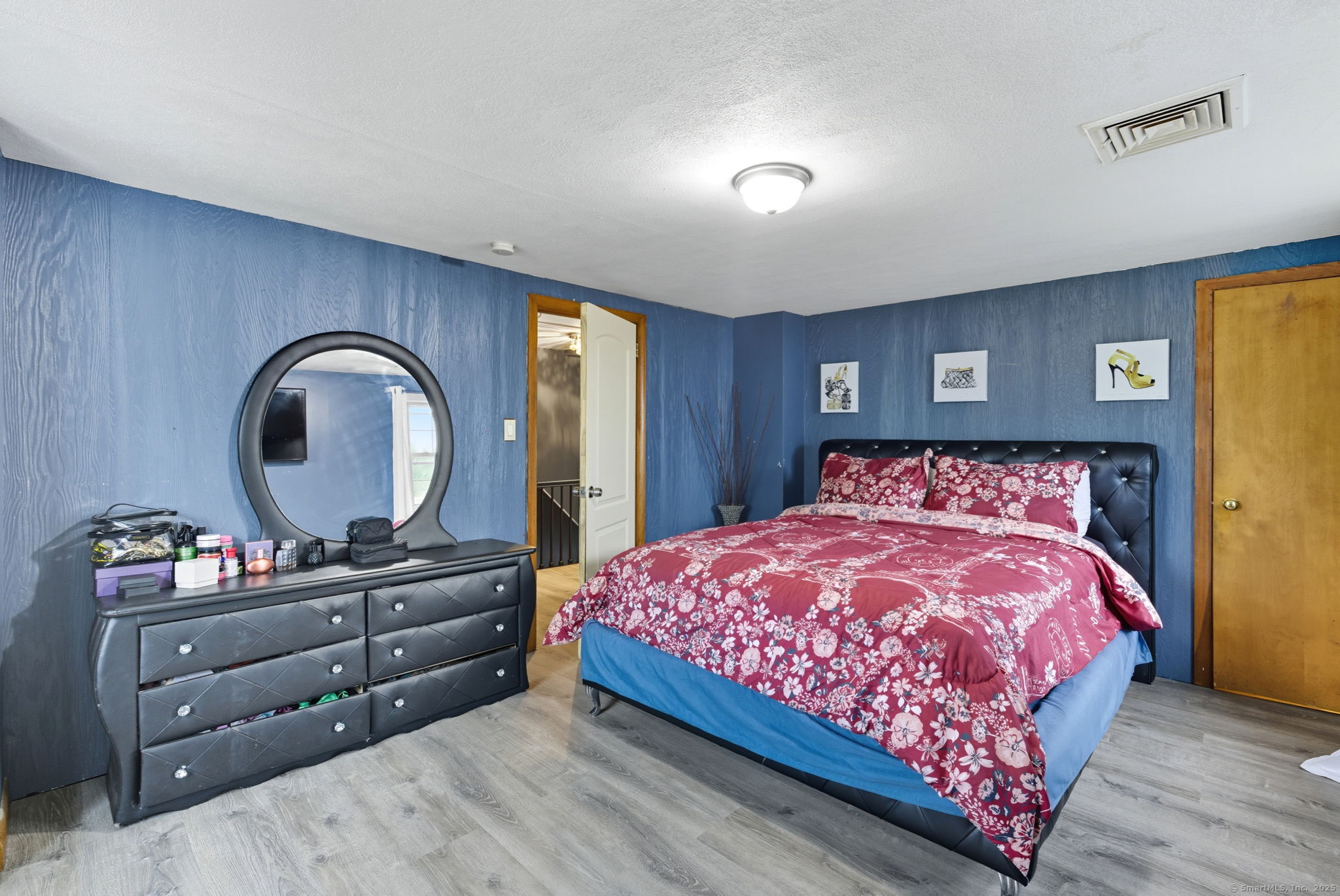 41 Chestnut Drive Windsor, CT 06095 - Photo 19 of 27 a bedroom with a bed and a dresser