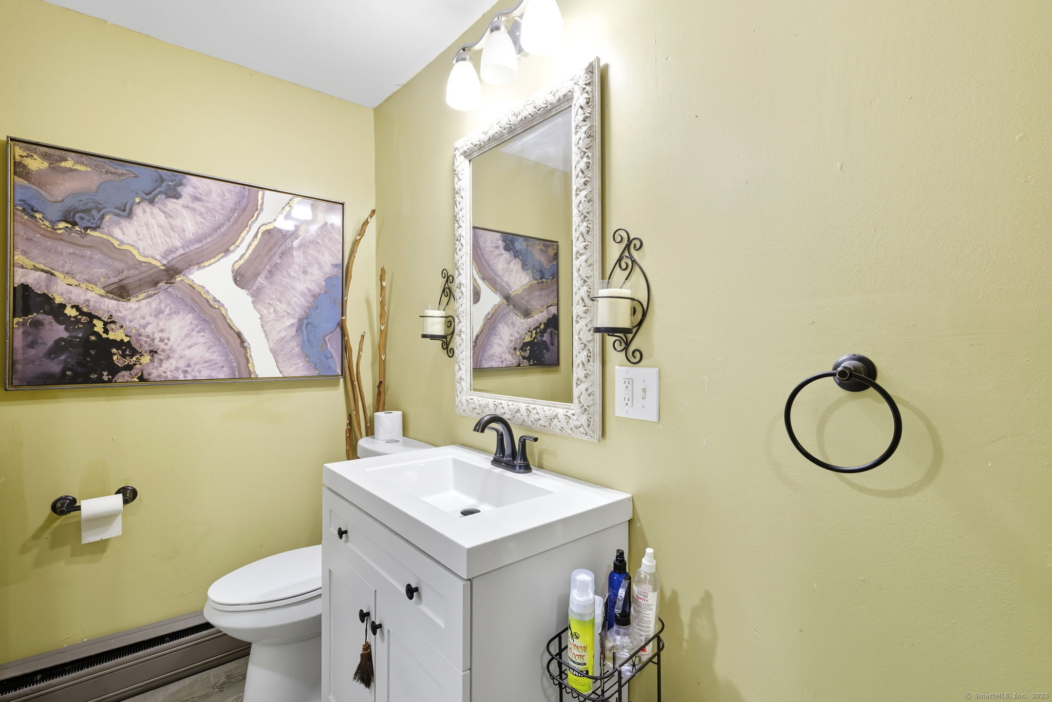 41 Chestnut Drive Windsor, CT 06095 - Photo 9 of 27 a bathroom with a sink mirror vanity and toilet