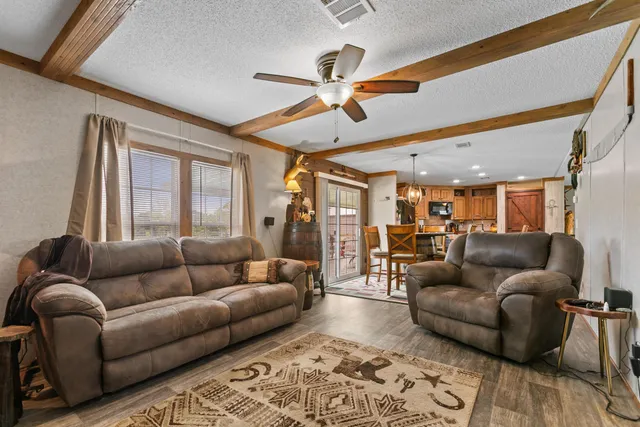 a bedroom with a bed and a table