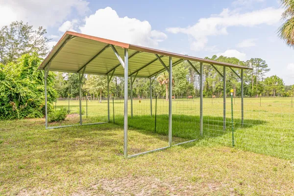 a view of a garden with an outdoor space