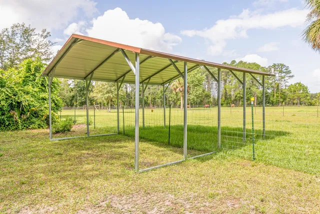 a view of a garden with an outdoor space