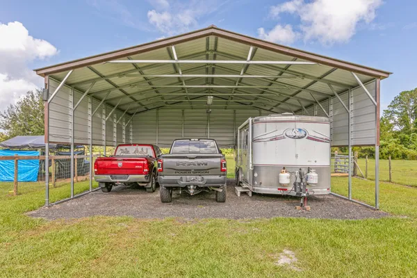 a view of a swimming pool with a lounge chair