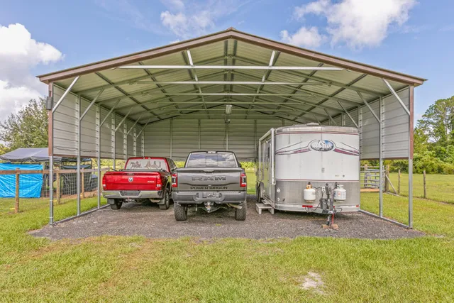 a view of a swimming pool with a lounge chair