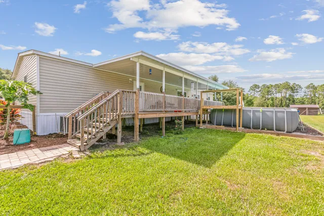 a view of a lake with a yard