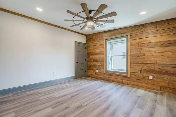 a view of a livingroom with wooden floor
