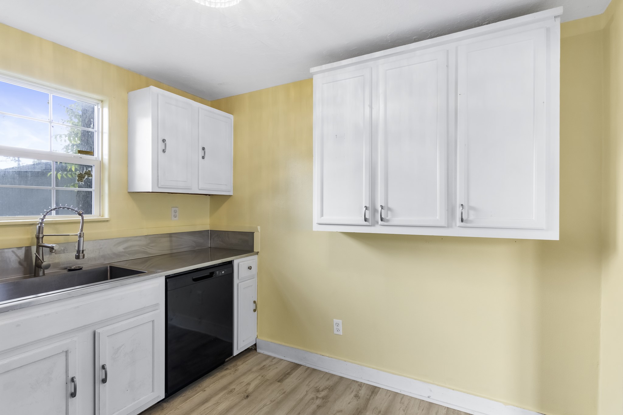 1200 4th Street Palacios, TX 77465 - Photo 16 of 44 a view of a kitchen with a sink