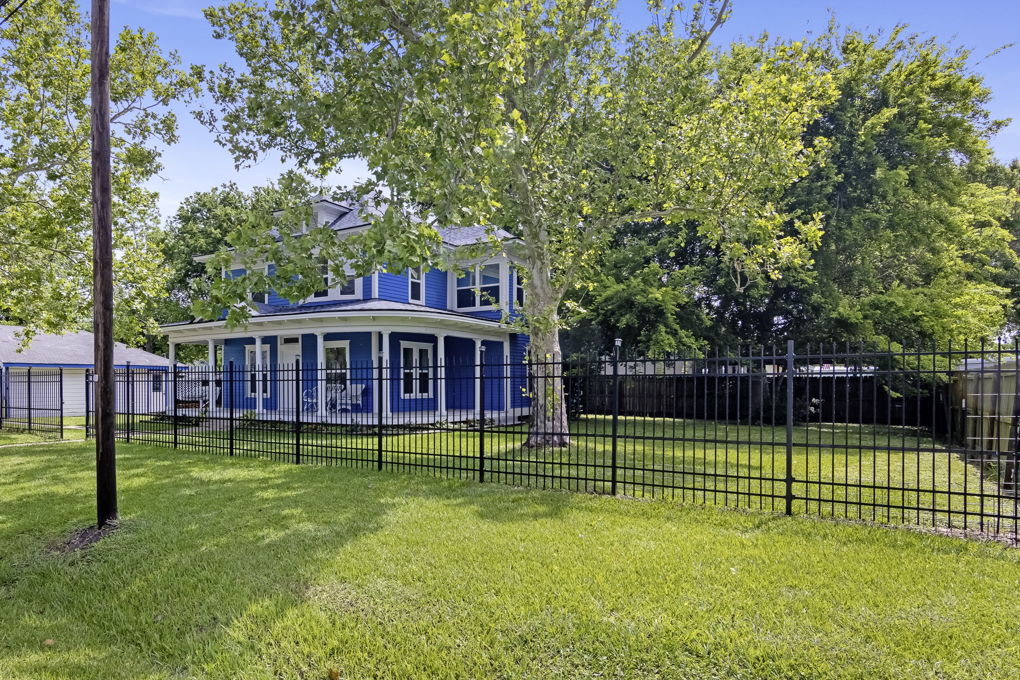 1200 4th Street Palacios, TX 77465 - Photo 2 of 44 a view of a house with a backyard