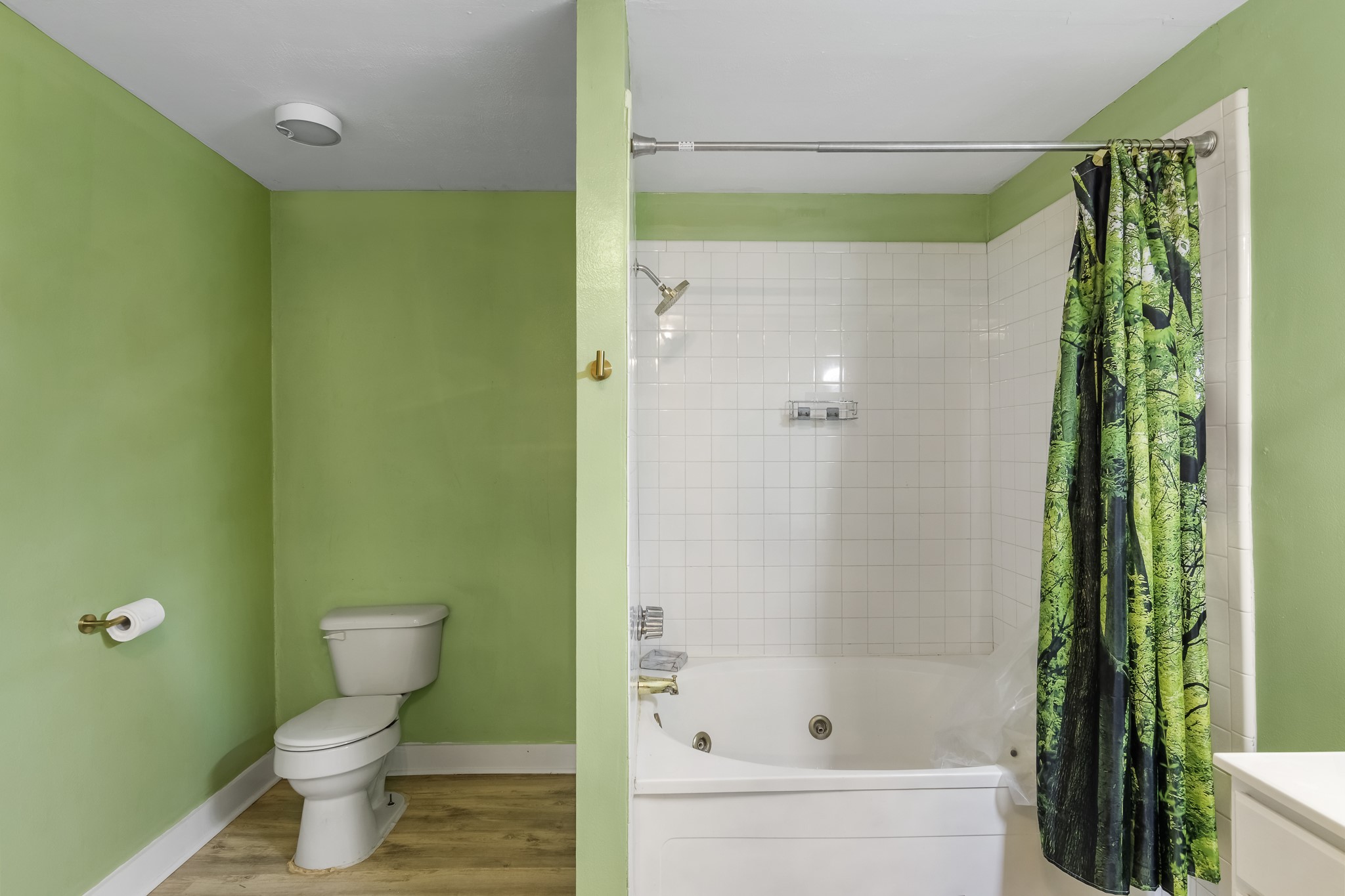 1200 4th Street Palacios, TX 77465 - Photo 23 of 44 a bathroom with a shower and a toilet