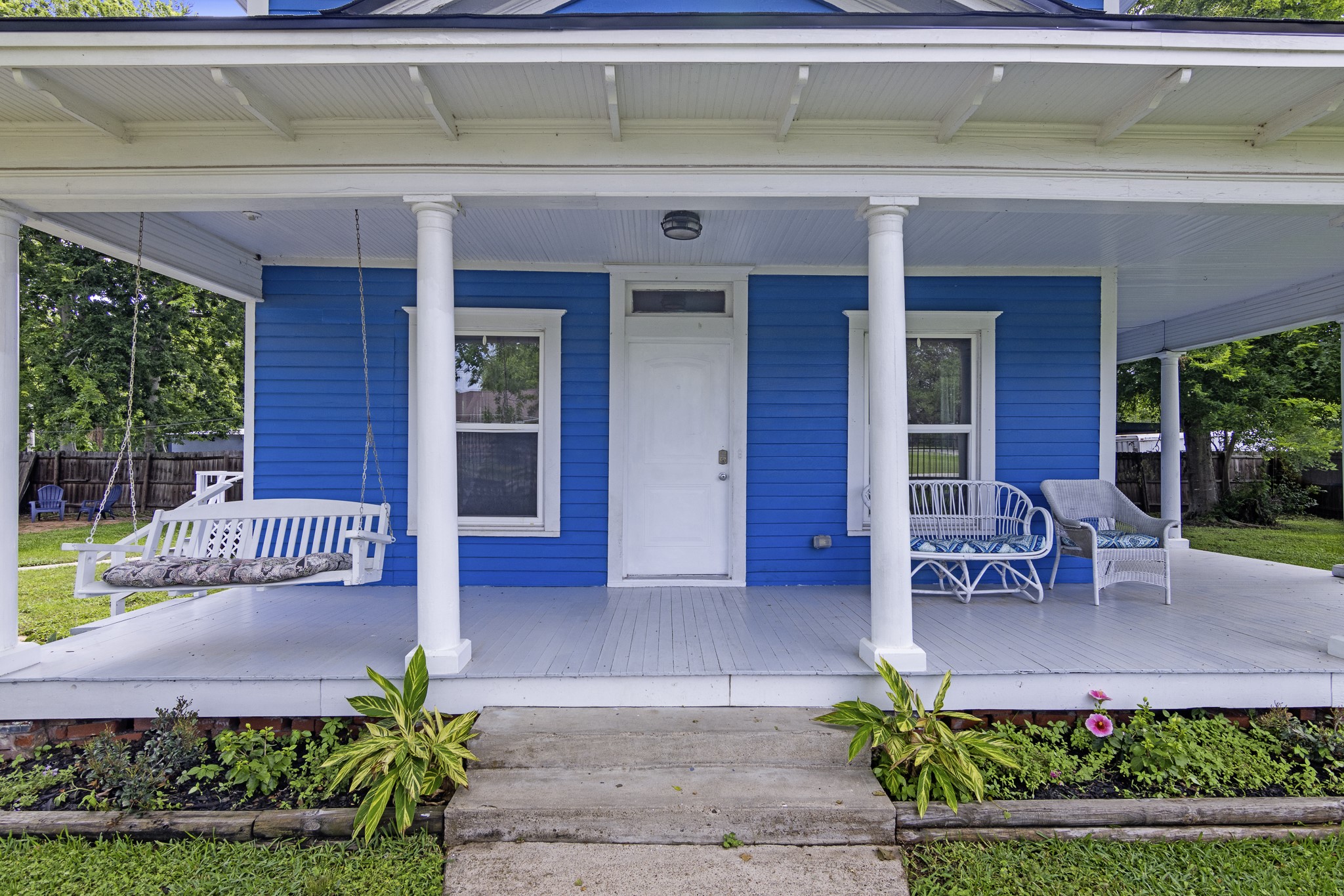 1200 4th Street Palacios, TX 77465 - Photo 4 of 44 a front view of a house with garden