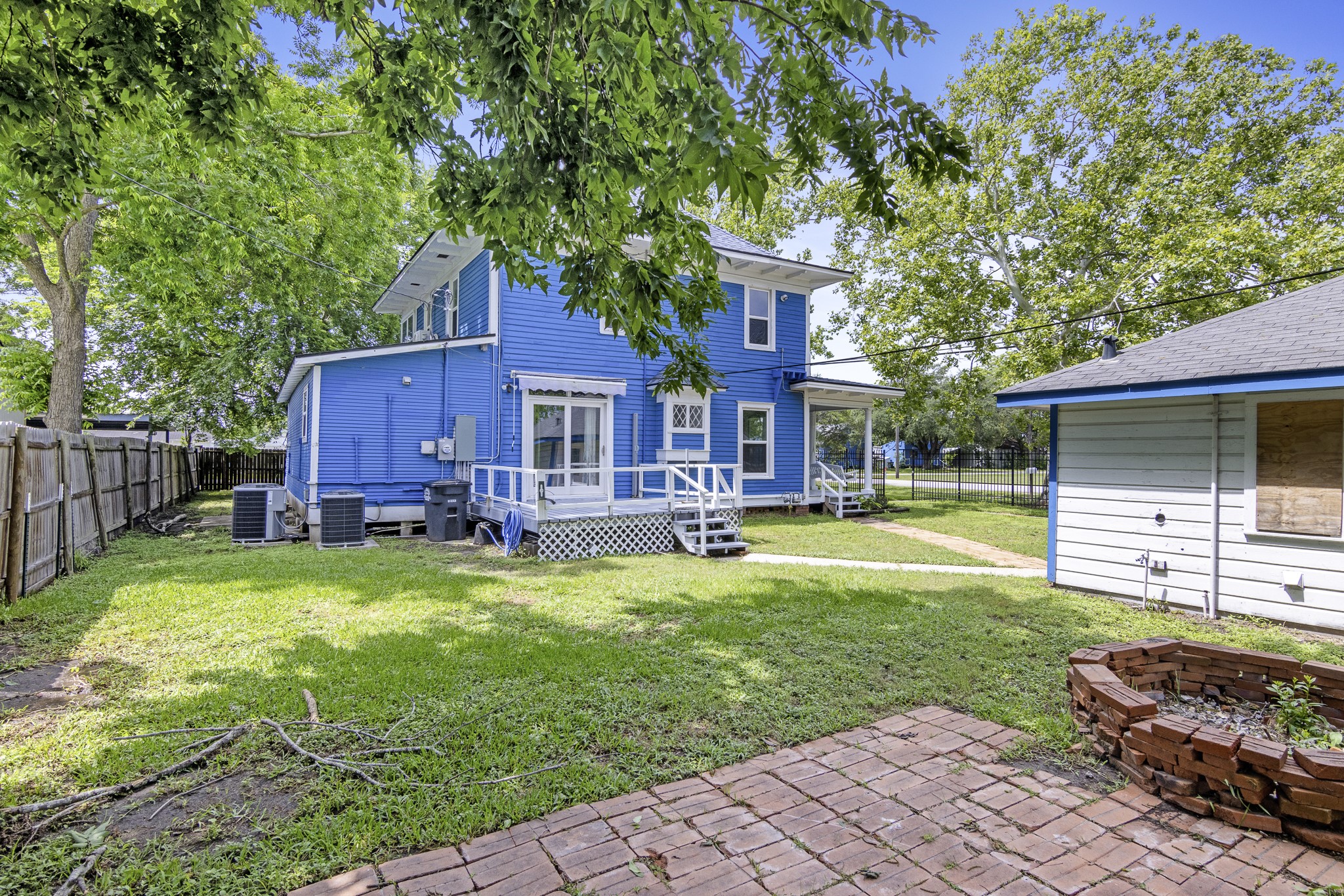 1200 4th Street Palacios, TX 77465 - Photo 41 of 44 a view of a house with swimming pool and a yard