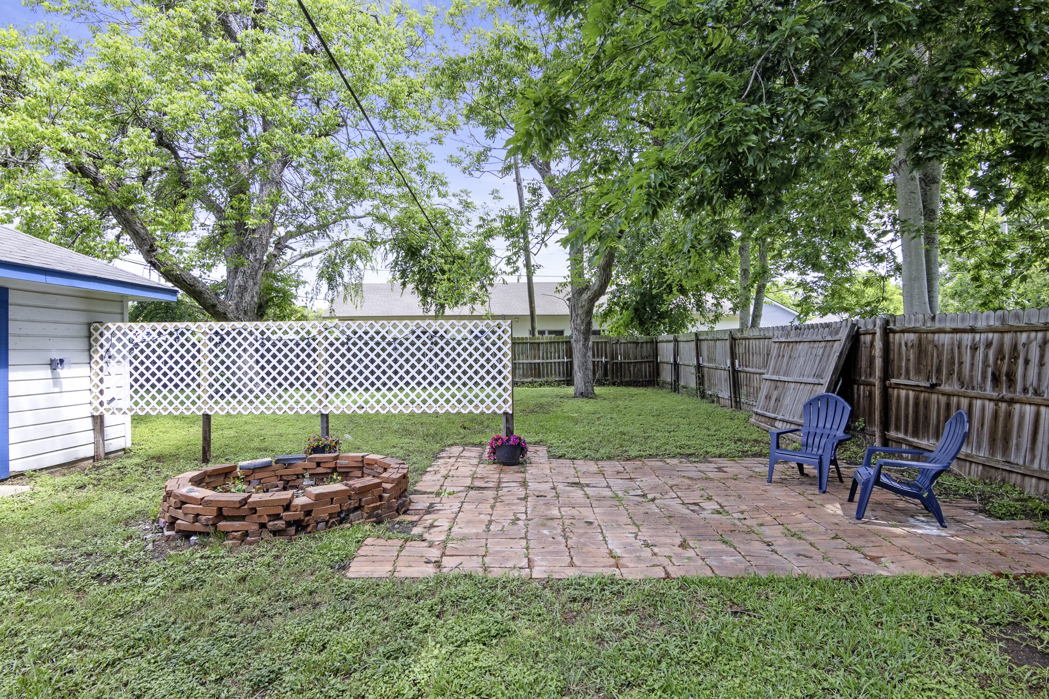 1200 4th Street Palacios, TX 77465 - Photo 44 of 44 a garden with furniture and wooden fence