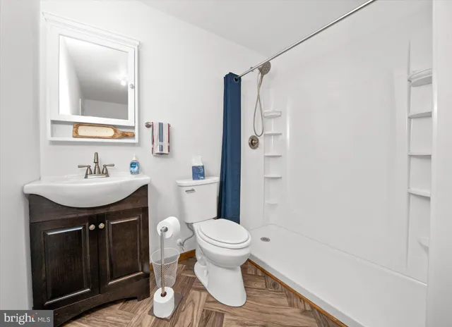 a aerial view of a house with a yard