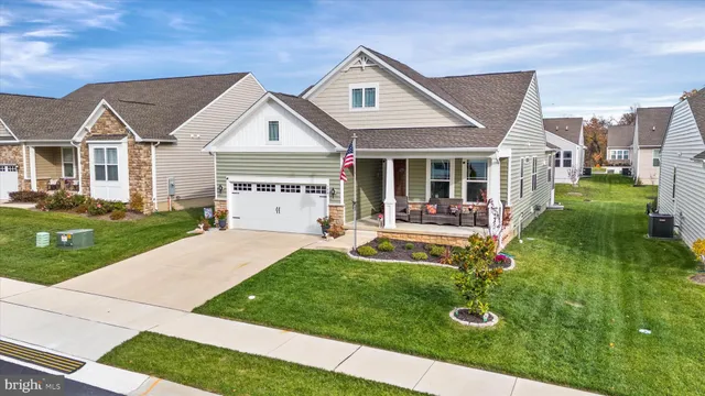 an aerial view of a house with outdoor space