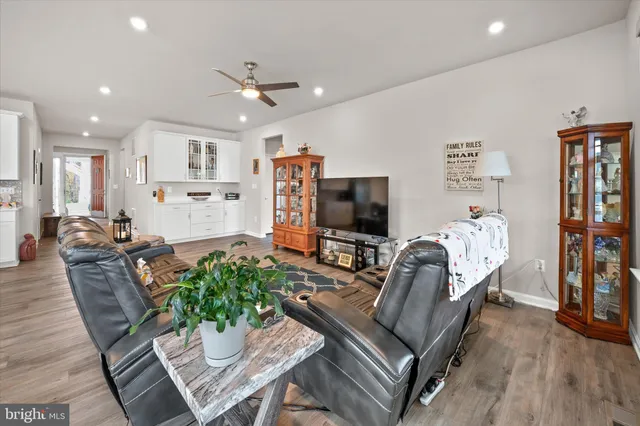 a living room with furniture and a table