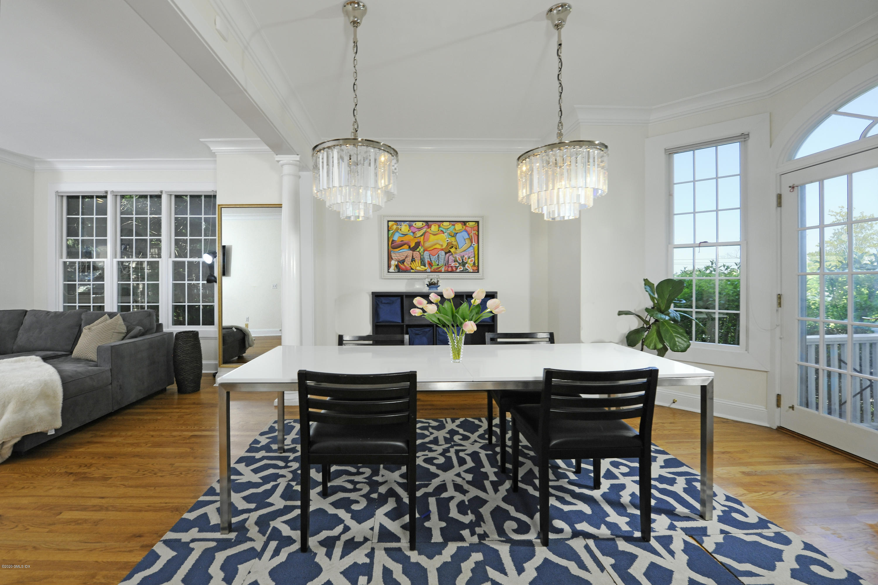 48 Spring Street, Unit 10 Greenwich, CT 06830 - Photo 4 of 11 a view of a livingroom and dining room