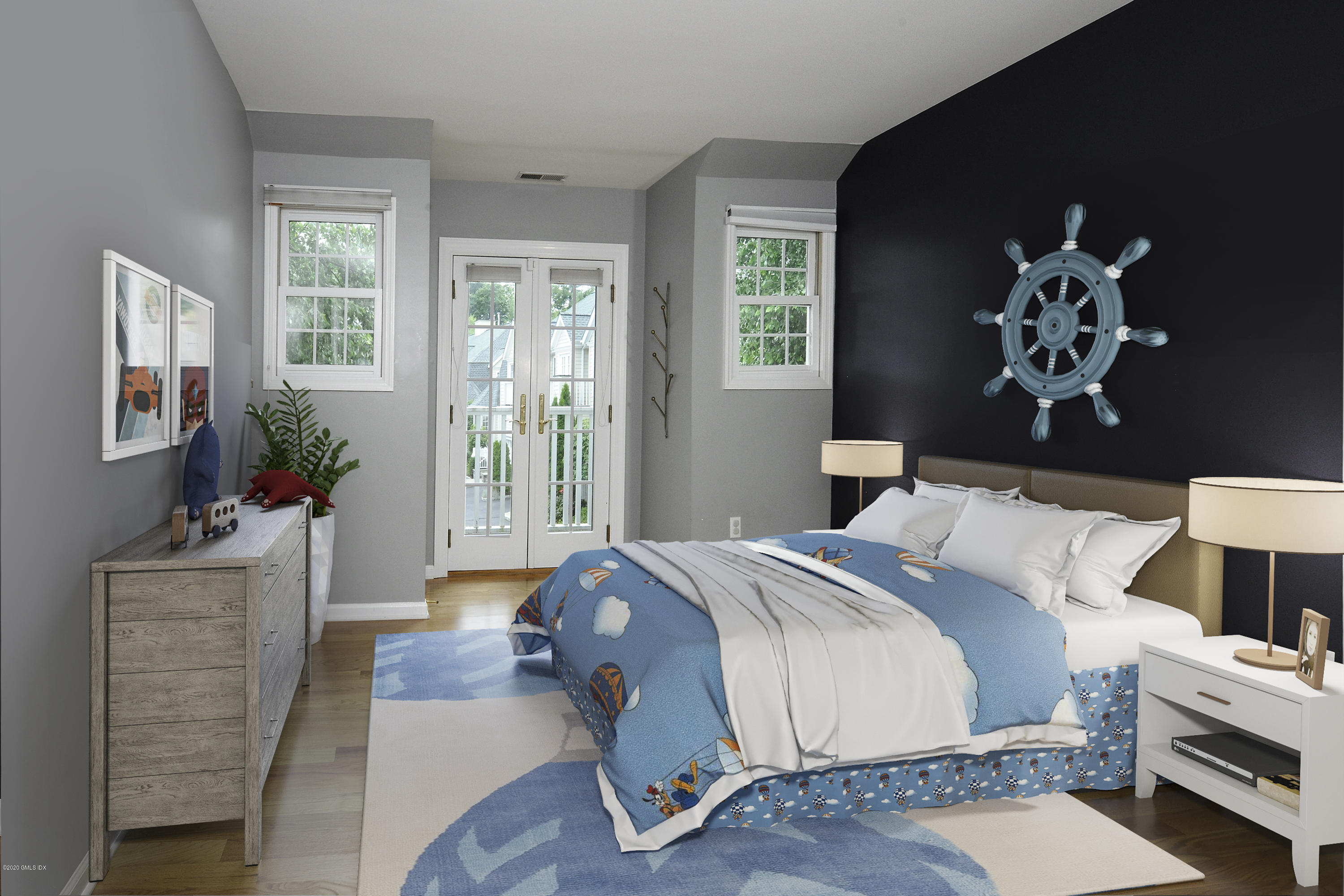 48 Spring Street, Unit 10 Greenwich, CT 06830 - Photo 8 of 11 a bedroom with a bed and a chair