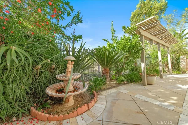 a view of a backyard with garden