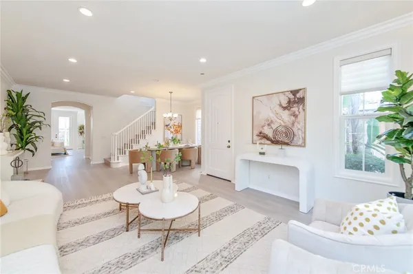 a living room with furniture and a table