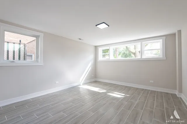 a view of an empty room and window