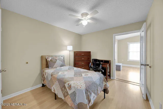 a view of a house with a yard and garage