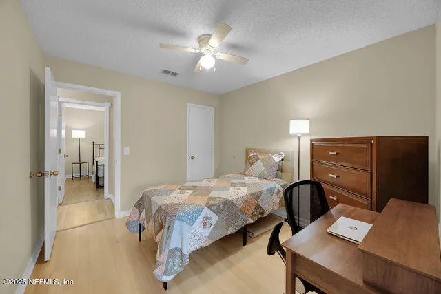 a view of an empty room with empty shelves