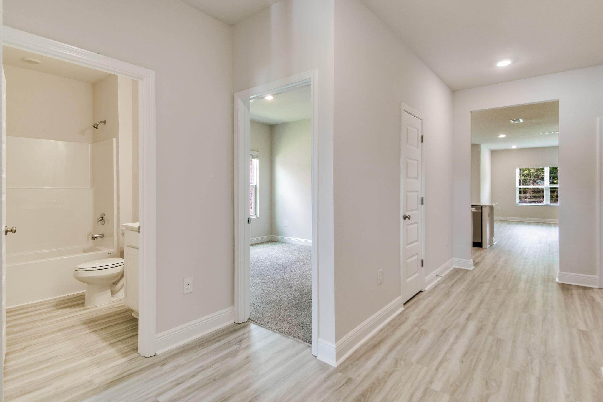8724 Bluebell Street Milton, FL 32583 - Photo 23 of 32 a bathroom with a sink and a toilet