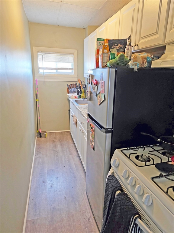 94 Snell Street Fall River, MA 02721 - Photo 13 of 15 a view of a kitchen with a window