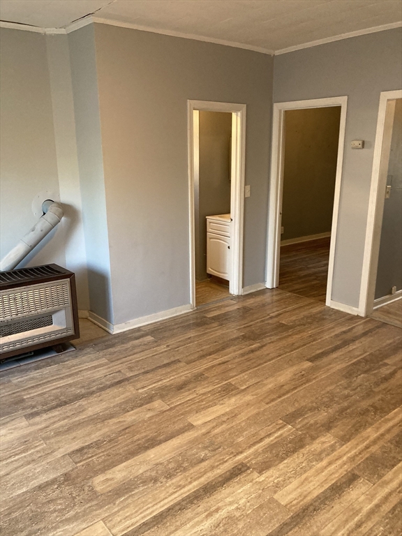 94 Snell Street Fall River, MA 02721 - Photo 6 of 15 a view of empty room with wooden floor