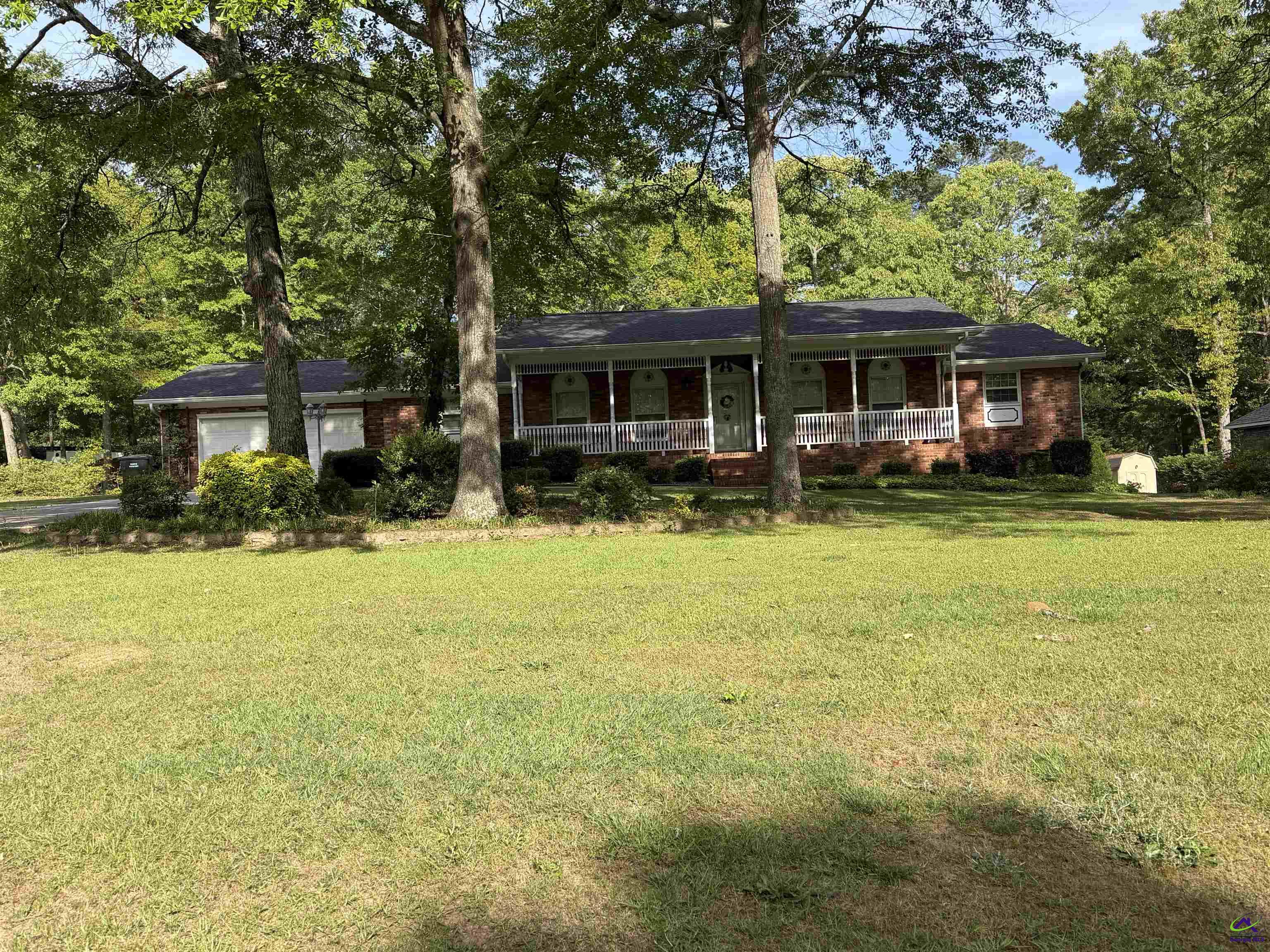 249 Hatcher Road Warner Robins, GA 31088 - Photo 1 of 25 a front view of a house with yard and green space