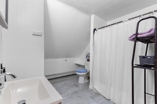24 Adams Street Springfield, MA 01105 - Photo 9 of 12 a bathroom with a sink toilet and shower