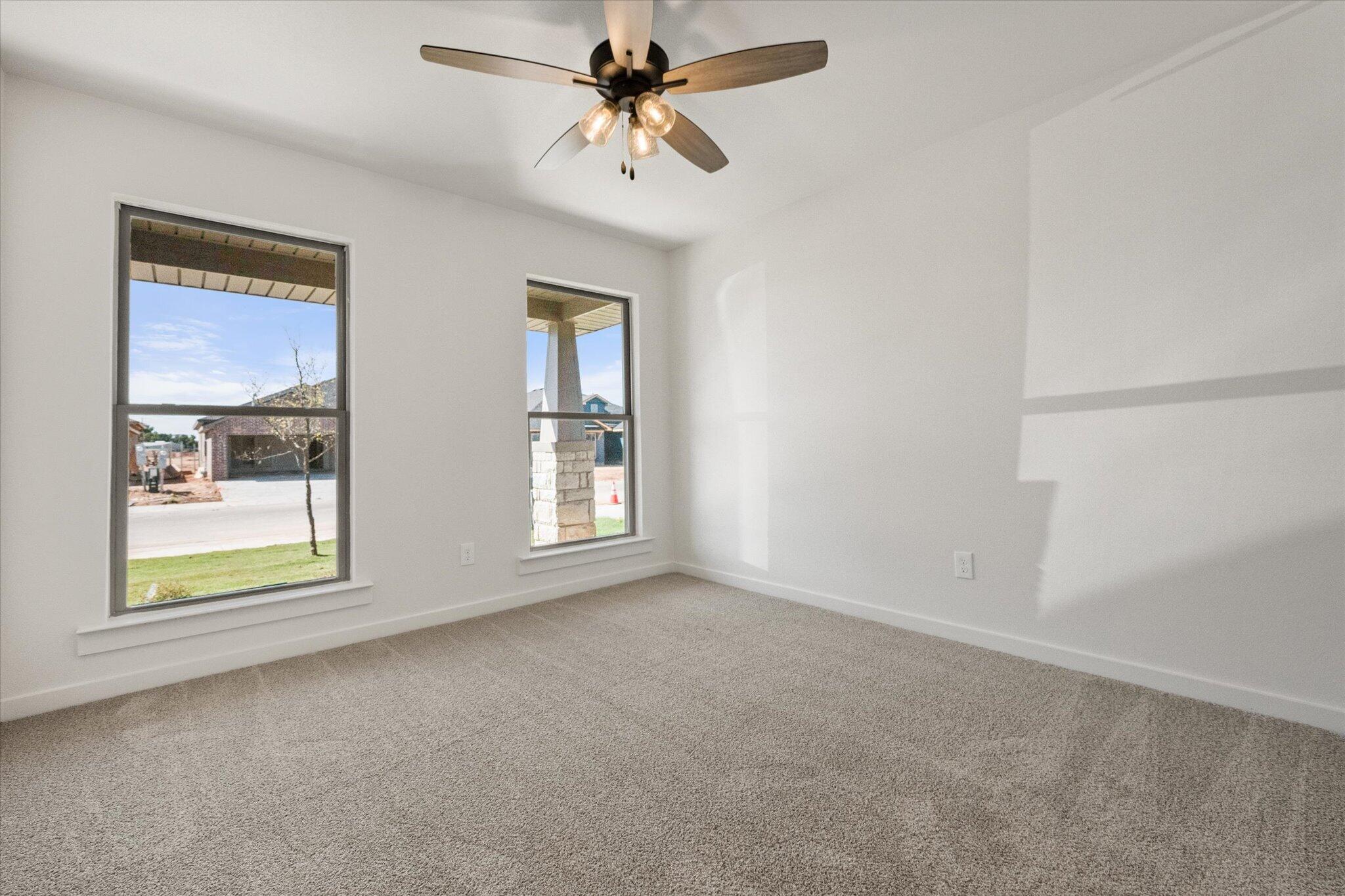 7003 53rd Street Lubbock, TX 79407 - Photo 21 of 25 a view of an empty room with a window