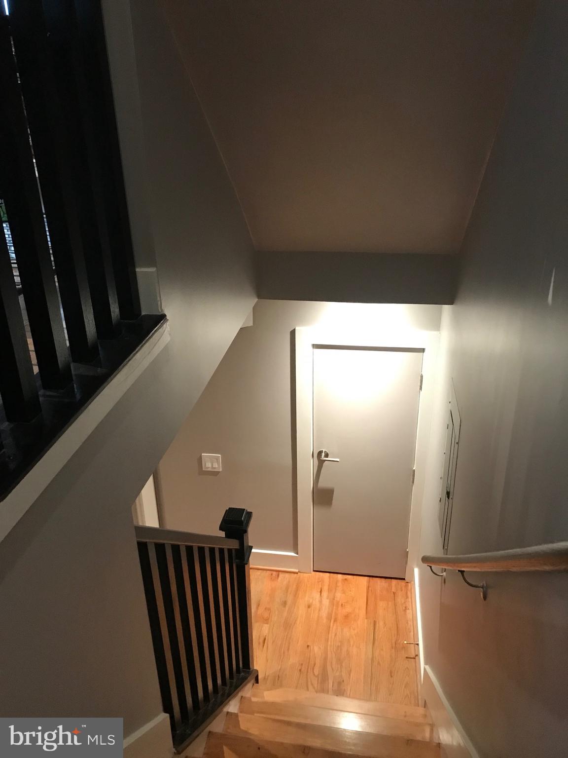 3219 12th Street Northeast, Unit 101 Washington, DC 20017 - Photo 11 of 20 Stairway to Bedroom Quarters