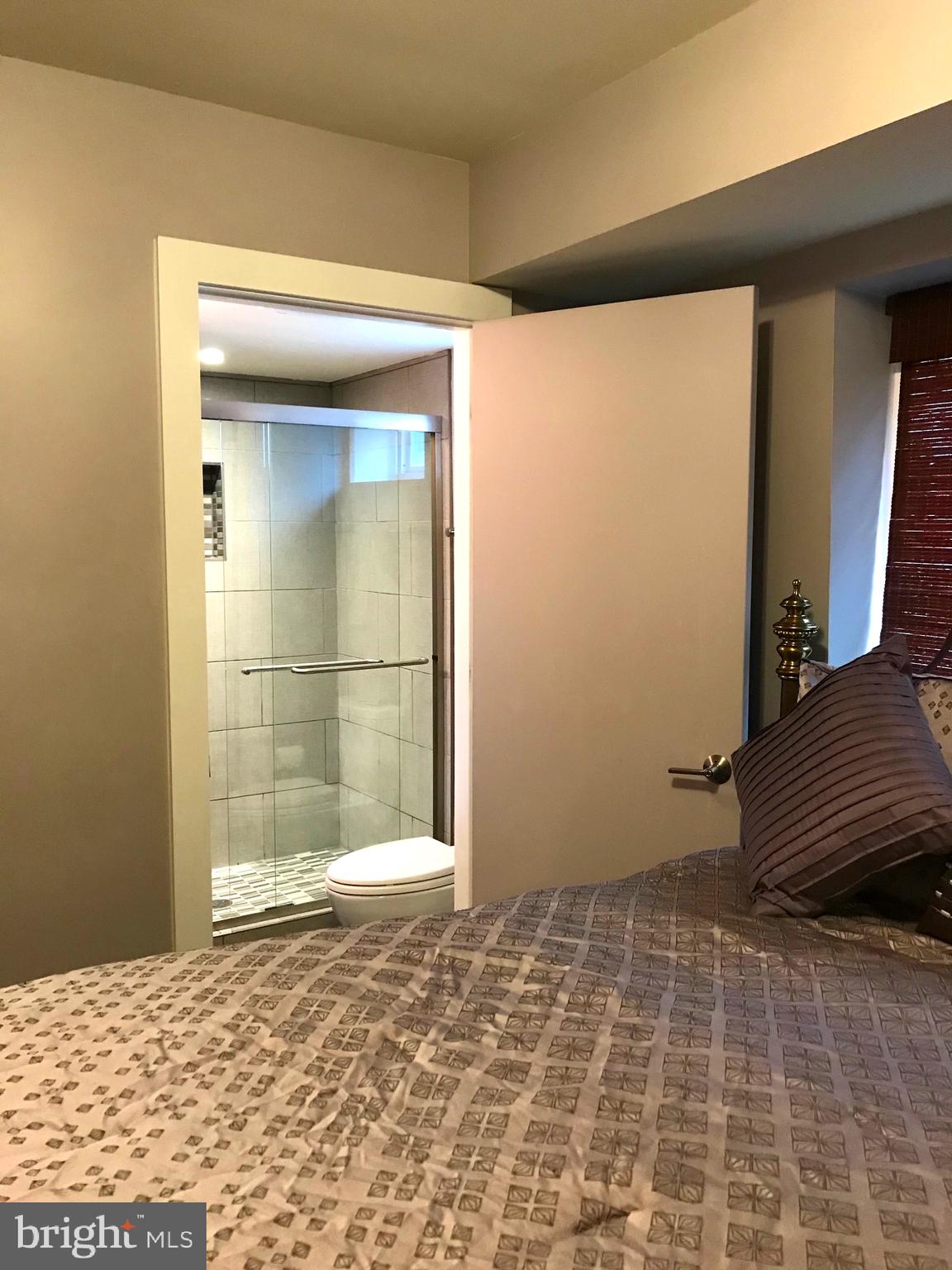 3219 12th Street Northeast, Unit 101 Washington, DC 20017 - Photo 18 of 20 En-Suite Bath for Bedroom Two