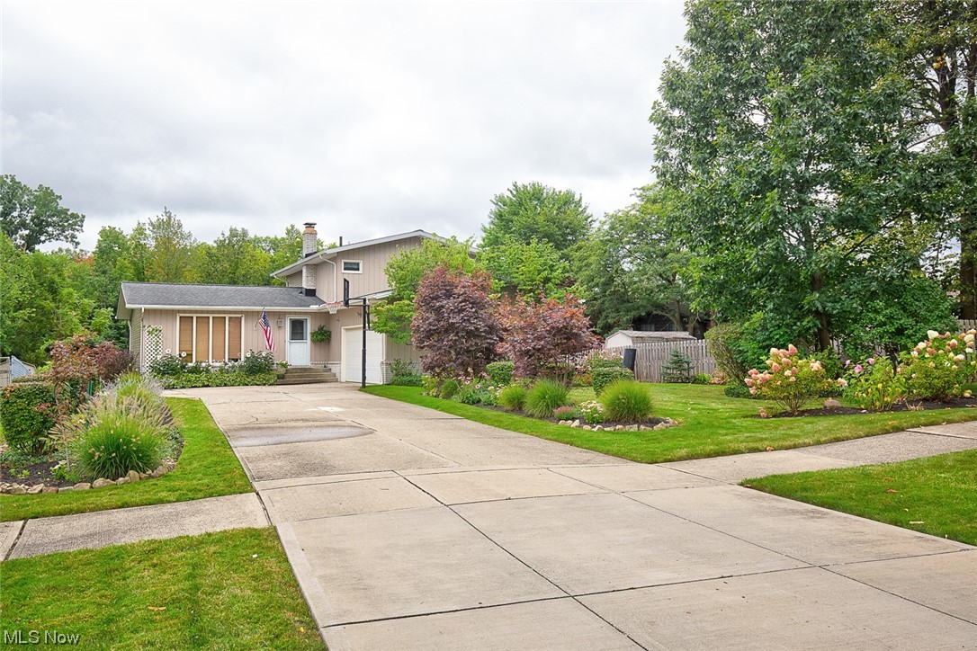31950 Cannon Road Solon, OH 44139 - Photo 1 of 33 View of front of house with a front yard