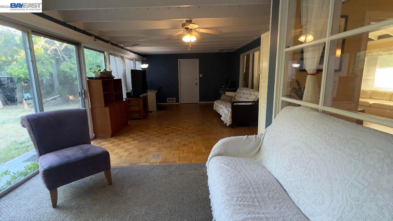 190 Alderwood Road Walnut Creek, CA 94598 - Photo 16 of 29 a living room with furniture and a large window
