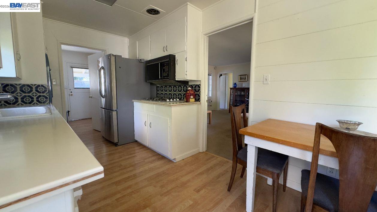 190 Alderwood Road Walnut Creek, CA 94598 - Photo 20 of 29 a bedroom with a bed and a flat screen tv
