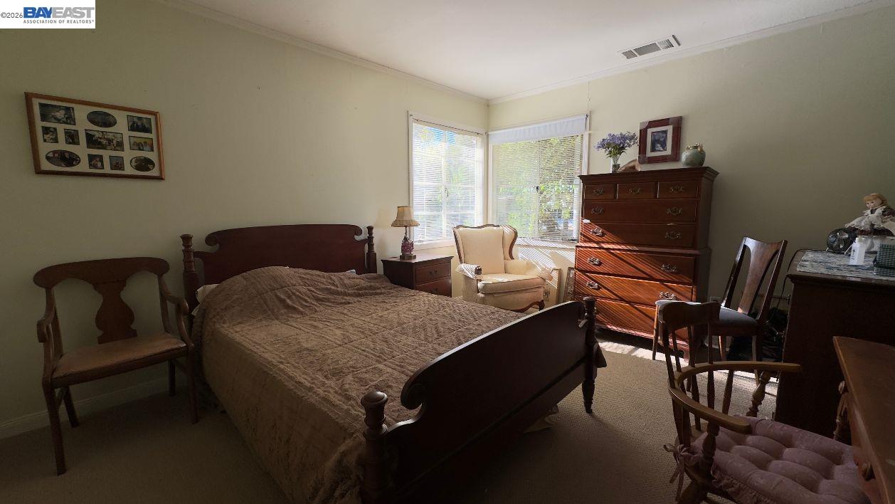 190 Alderwood Road Walnut Creek, CA 94598 - Photo 21 of 29 a living room with furniture and a flat screen tv