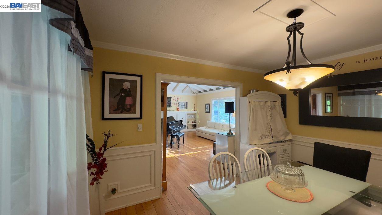 190 Alderwood Road Walnut Creek, CA 94598 - Photo 6 of 29 a dining room with furniture and a chandelier