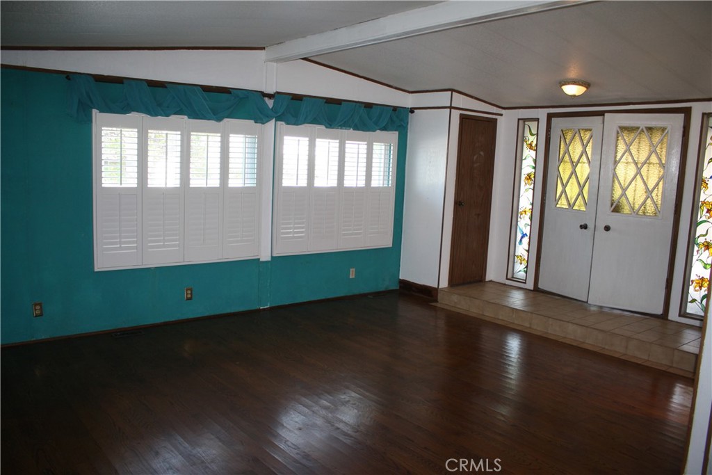 17700 South Avalon, Unit 411 Carson, CA 90746 - Photo 14 of 39 a view of a room with wooden floor and window