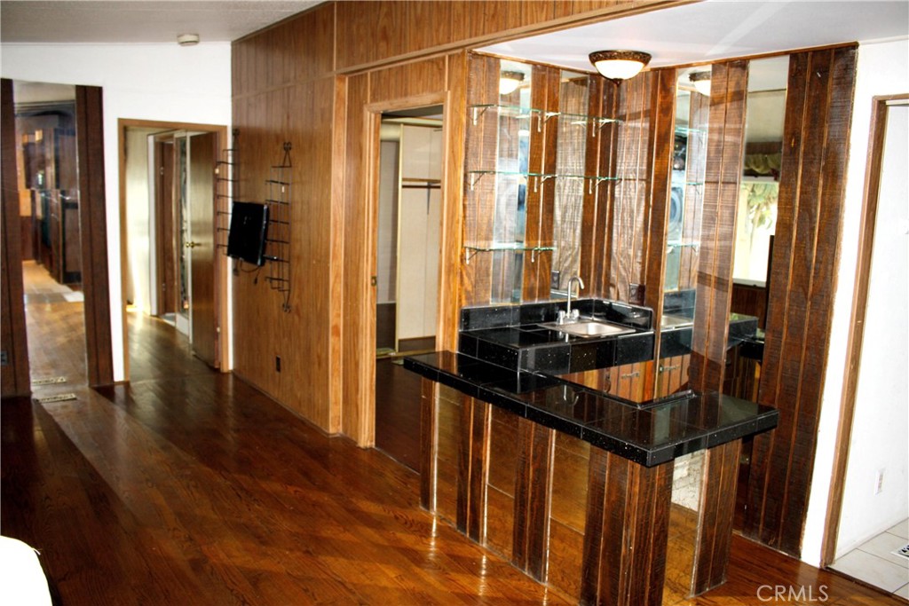 17700 South Avalon, Unit 411 Carson, CA 90746 - Photo 22 of 39 a kitchen with stainless steel appliances a sink and a refrigerator